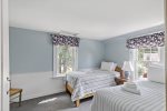 Twin bedroom 1 with two twin beds and central AC Vents